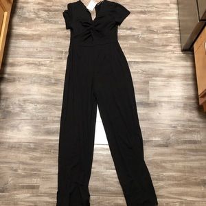 Black medium jumpsuit never worn new with tags